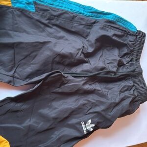 Adidas woman’s track pants joggers. High waisted fit. Super cool.